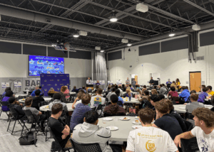 large room with students and large monitor