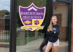 Nora Riley stands in front of Bardstown High School.
