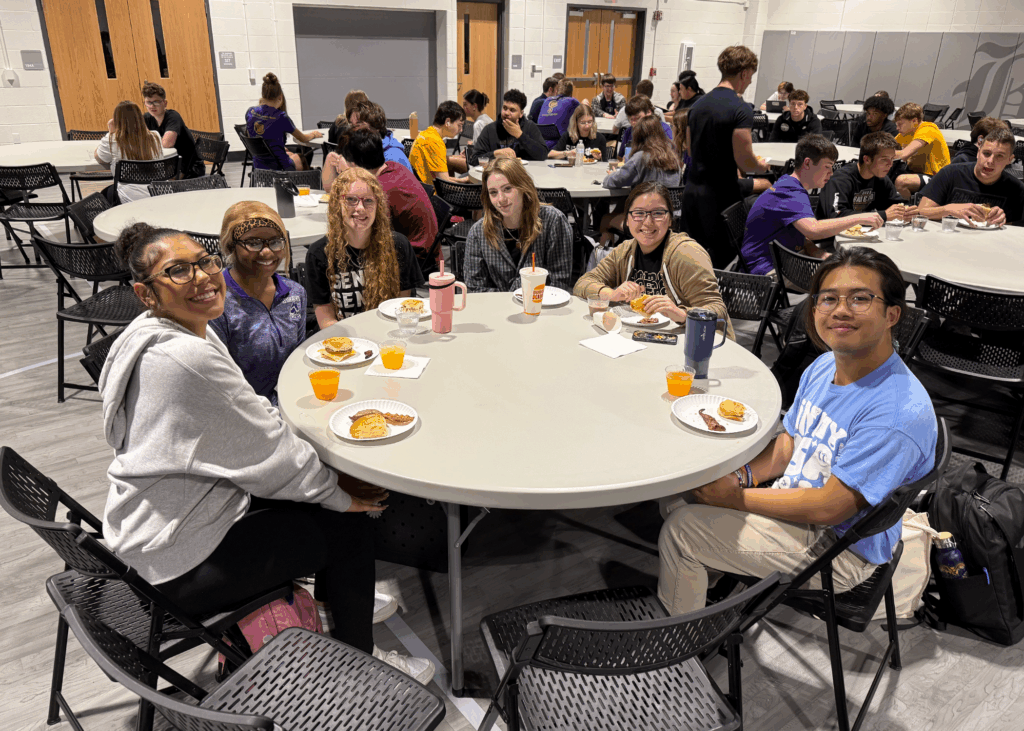 six students at table