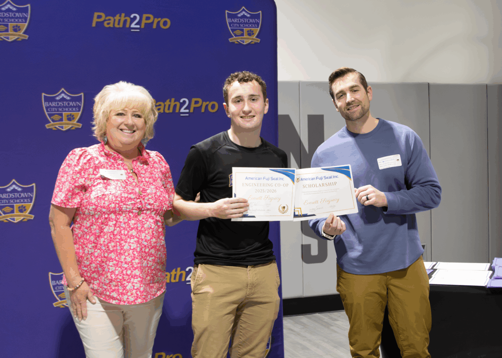 American Fuji Seal employees giving BHS student award