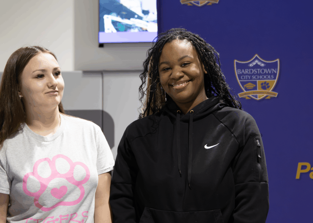 two students smiling
